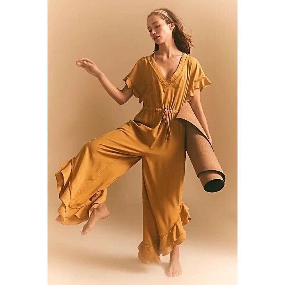 NWT FREE PEOPLE MOVEMENT Sz XS SHELTER ONE PIECE JUMPSUIT RUFFLE JUMPER GOLD